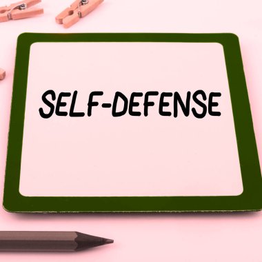 Conceptual display Self Defense, Concept meaning the act of defending ones person when physically attacked