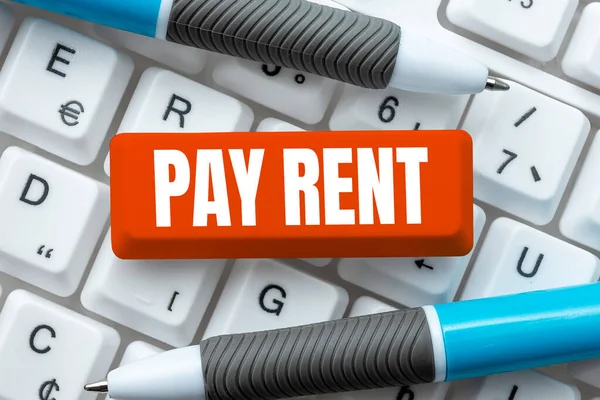 Sign displaying Pay Rent, Word for To pay money in exchange for the use of someone elses property