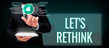 Text caption presenting Lets Rethink, Word Written on an Afterthought To Remember Reconsider Reevaluate