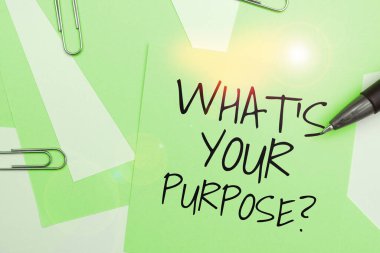 Hand writing sign Whats Your Purpose, Word Written on question to find out reason for something is done or for which exists