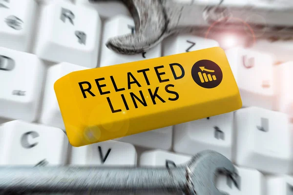 Hand writing sign Related Links, Word Written on Website inside a Webpage Cross reference Hotlinks Hyperlinks