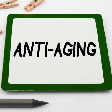 Conceptual caption Anti Aging, Word Written on A product designed to prevent the appearance of getting older