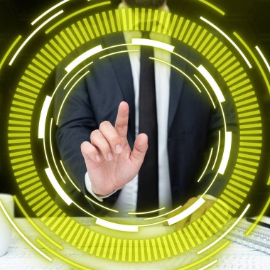 Man sitting at the table and pressing virtual button with his finger.