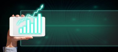 Hand Holding mobile phone presenting New Futuristic Technologies.