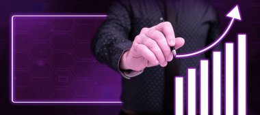 Businessman Holding Pen Writing and Presenting Futuristic Technology.