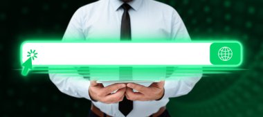 Businessman holding tablet with two hands. Glow going from device.