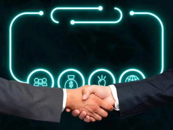 Two men in suits shaking hands in front futuristic style background