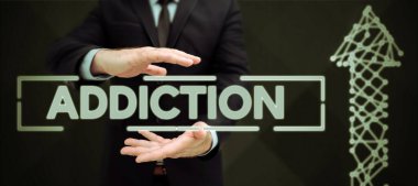 Belirli bir madde veya etkinliğe bağımlı olmak koşuluyla yazılmış İşaret Bağımlılığını gösteren ilham