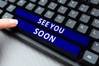 El yazısı işareti. Görüşürüz. Biriyle vedalaşmak için kullanılan kavramsal fotoğraf.