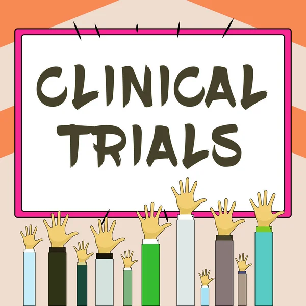 Hand writing sign Clinical Trials, Word Written on Research investigation to new treatments to people