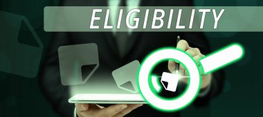 Hand writing sign Eligibility, Concept meaning State of having the right for doing or obtain something Proper