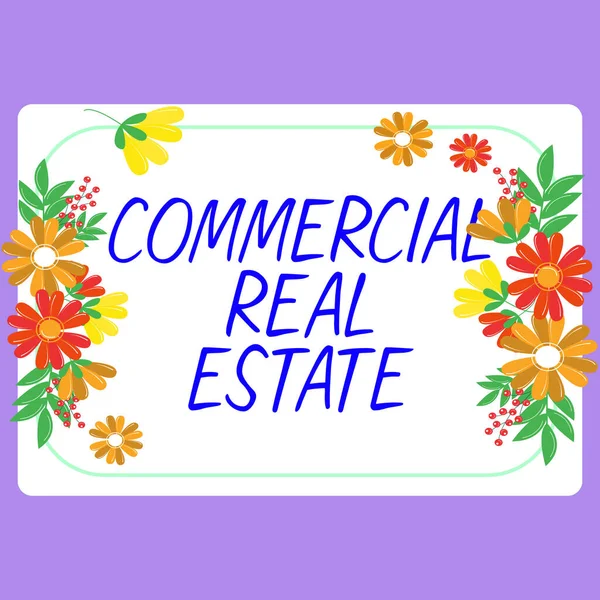 Sign displaying Commercial Real Estate, Word for Income Property Building or Land for Business Purpose