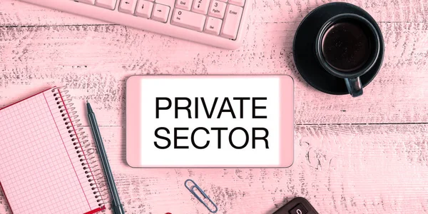 Text sign showing Private Sector, Concept meaning a part of an economy which is not controlled or owned by the government