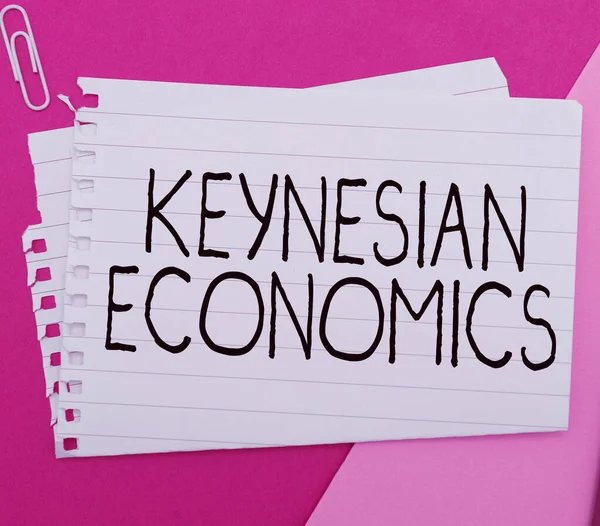 stock image Writing displaying text Keynesian Economics, Conceptual photo monetary and fiscal programs by government to increase employment