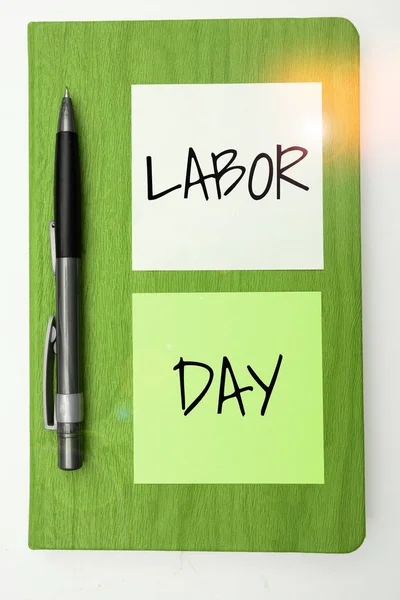 Writing displaying text Labor Day, Business idea an annual holiday to celebrate the achievements of workers