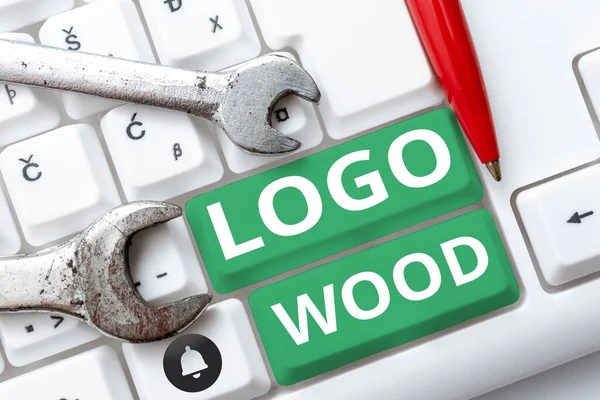 Sign displaying Logo Wood, Conceptual photo Recognizable design or symbol of a company inscribed on wood