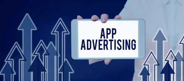アプリ広告の表示にサイン ビジネスアイデアの開発者は モバイルアプリで広告を提供するために支払われます — ストック写真