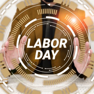 El yazısı tabelası İşçi Bayramı, İşçilerin başarılarını kutlamak için yıllık bir tatil yaklaşımı