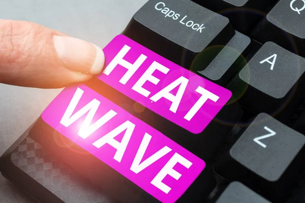 stock image Hand writing sign Heat Wave, Conceptual photo a prolonged period of abnormally hot weather