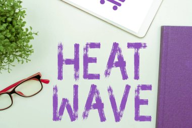 Conceptual caption Heat Wave, Word Written on a prolonged period of abnormally hot weather