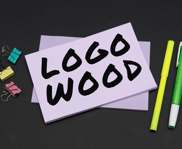 Conceptual caption Logo Wood, Business showcase Recognizable design or symbol of a company inscribed on wood