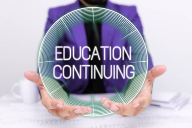Handwriting text Education Continuing, Concept meaning acquisition of knowledge and skills thru training