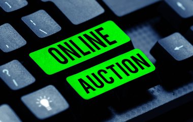 Handwriting text Online Auction, Business approach process of buying and selling goods or services online
