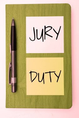 Writing displaying text Jury Duty, Business overview obligation or a period of acting as a member of a jury in court