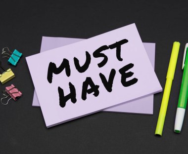 Writing displaying text Must Have, Internet Concept something modern that many people want to have Essential item