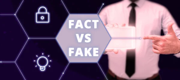 stock image Writing displaying text Fact Vs Fake, Concept meaning Is it true or is false doubt if something is real authentic
