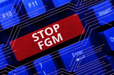 Stop Fgm, Kavramsal Fotoğrafı gösteren metin işareti kadın cinsel organının kesilmesi ve kadın sünnetine son verdi.