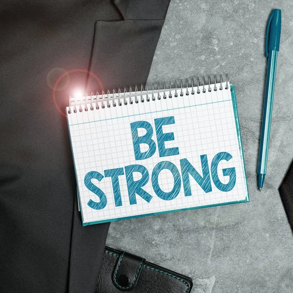 Text sign showing Be Strong, Word for able to withstand great circumstances or pressure in life