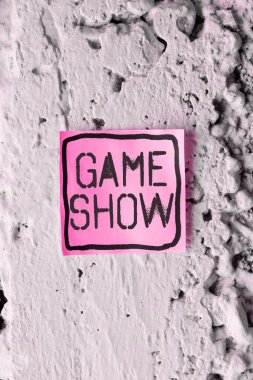 Writing displaying text Game Show, Business overview Program in television or radio with players that win prizes