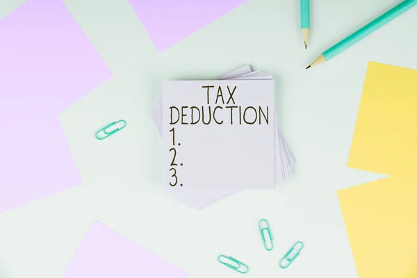 Conceptual Caption Tax Deduction Conceptual Photo Amount Subtracted Income Calculating — Stockfoto
