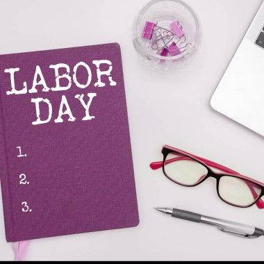 Conceptual caption Labor Day, Word for an annual holiday to celebrate the achievements of workers