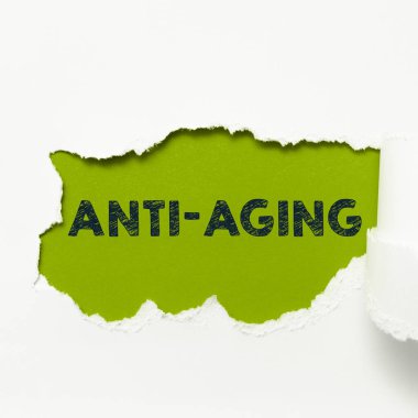 Conceptual caption Anti Aging, Word for A product designed to prevent the appearance of getting older