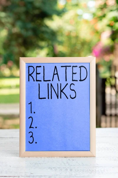 Sign displaying Related Links, Internet Concept Website inside a Webpage Cross reference Hotlinks Hyperlinks