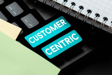 Sign displaying Customer Centric, Business approach process of looking after customers to ensure their pleasure