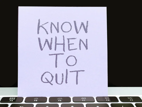 stock image Hand writing sign Know When To Quit, Conceptual photo be aware of the right moment to give up retirement