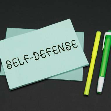 El yazısı işareti, nefsi müdafaa, yani fiziksel saldırıya uğrayan kişiyi savunma eylemi.