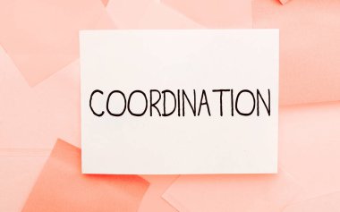Sign displaying Coordination, Word Written on the acts of someone supportive in doing what is needed