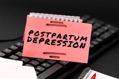 Handwriting text Postpartum Depression, Word Written on a mood disorder involving intense depression after giving birth