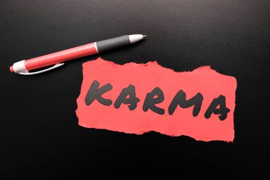 İlham veren Karma 'yı gösteren metin, bu ve önceki varoluş hallerindeki bir kişinin eylemlerinin toplamı üzerine yazılmış Sözcük