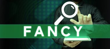 Süslü, iş dünyasının gösterisini gösteren bir metin yazısı. Yüzeysel ya da geçici bir hoşlanma ya da çekim hissi.