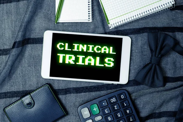 Text sign showing Clinical Trials, Conceptual photo Research investigation to new treatments to people