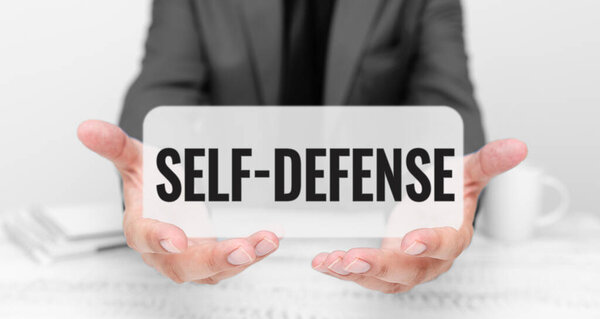 Conceptual display Self Defense, Internet Concept the act of defending ones person when physically attacked