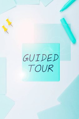 Text caption presenting Guided Tour, Word Written on advice or information aimed at resolving problem or difficulty