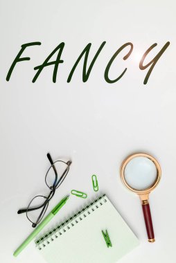 Süslü, İş Genel Bakış 'ı gösteren bir tabela. Yüzeysel ya da geçici bir hoşlanma ya da çekim hissi.