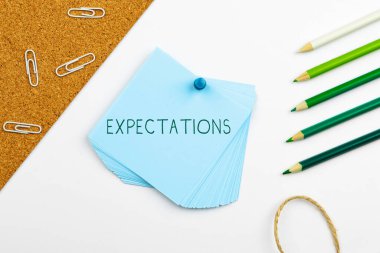 Hand writing sign Expectations, Word for Strong belief that something will happen or be the case