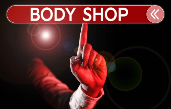 Text sign showing Body Shop, Business idea a shop where automotive bodies are made or repaired